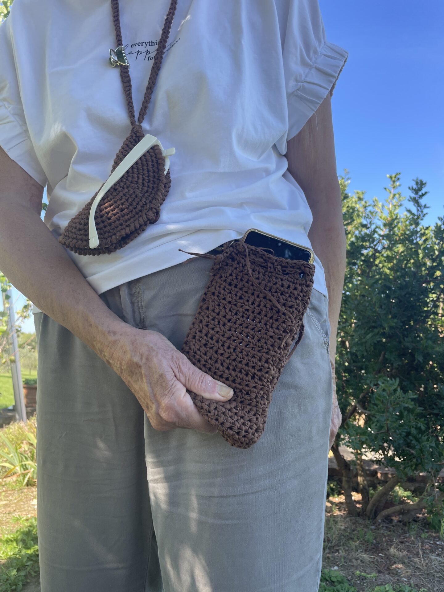 It is an example of two crochet items. One is for your mobile phone and the other for sunglasses