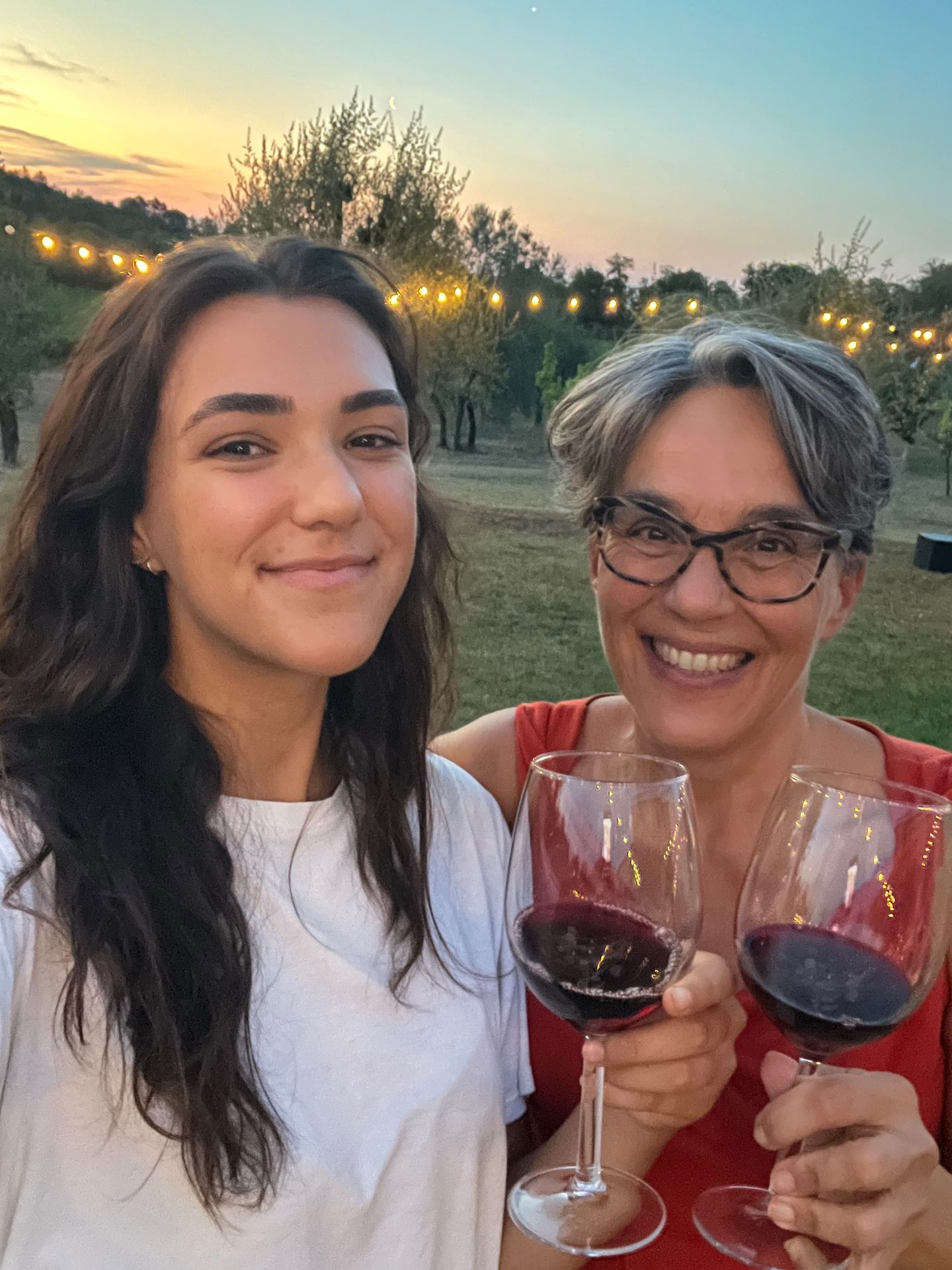 Ilaria and Ludovica with a Chianti wine glass